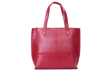 Beyaz arka planda kırmızı şık kadınlar için deri çanta.