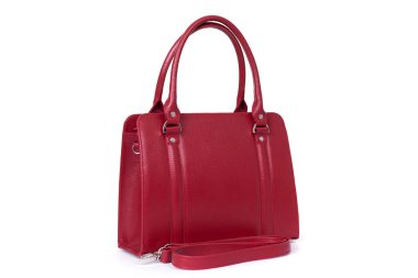 Beyaz arka planda kırmızı şık kadınlar için deri çanta.