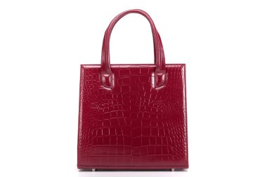 Beyaz arka planda kırmızı şık kadınlar için deri çanta.