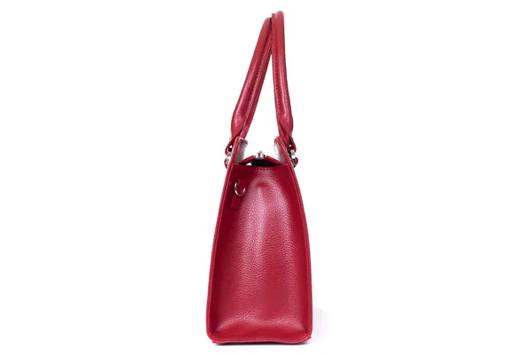 Red stylish ladies leather bag on a white background, side view — Stock Fotó