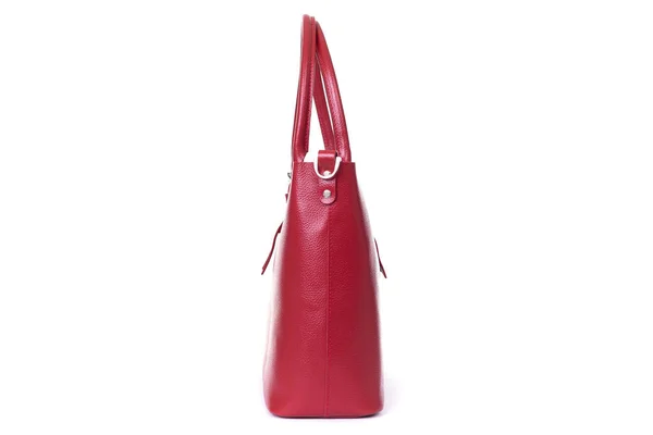 Red stylish ladies leather bag on a white background, side view — Stock Fotó