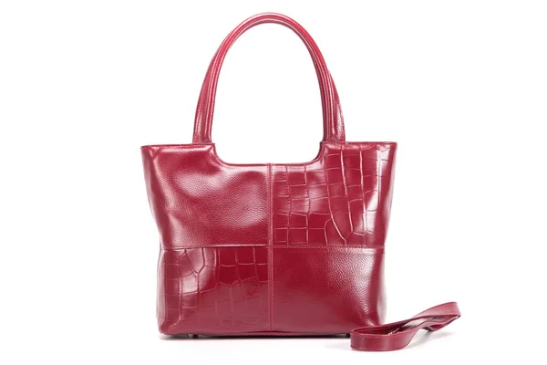Красный стильный женский кожаная сумка на белом фоне — стоковое фото