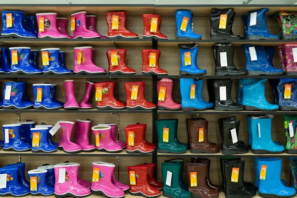 childrens bright shoe store with a large selection of colors, models and sizes