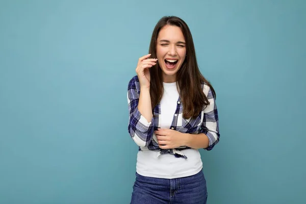 Photo shot of cute nice charming gorgeous attractive pretty youngster happy woman wearing stylish clothes isolated over colorful background with copy space and having fun — 스톡 사진