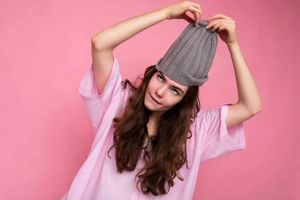 Beautiful positive happy young dark brunette woman isolated over colourful background wall wearing casual stylish clothes feeling sincere emotions — Stock Photo, Image