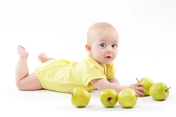 Cute baby lying on the background and smiling — Stock Photo, Image
