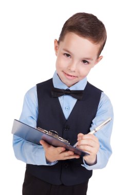 student in a business suit on a white background taking notes in