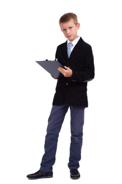 student in a business suit on a white background taking notes in