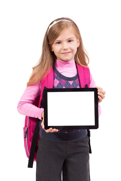 Scuola ragazza con un tablet in mano guardando la fotocamera e smi — Foto Stock