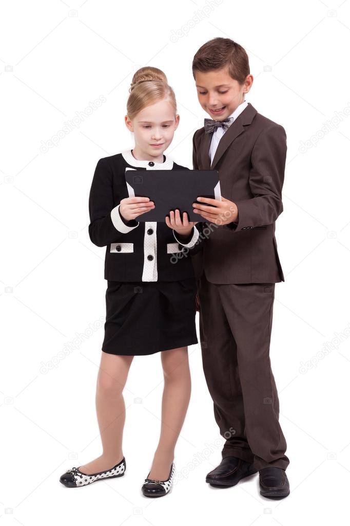 little boys and girls in business suits on white background with