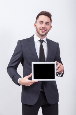 smiling successful young specialist on a white background in a c