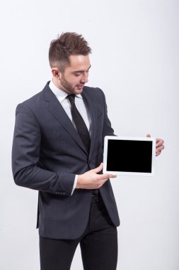 smiling successful young specialist on a white background in a c