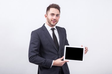 smiling successful young specialist on a white background in a c