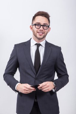 Young successful and confident man on a white background simple 
