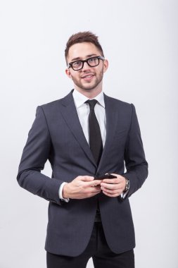 Young successful and confident man on a white background simple 