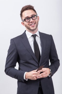 Young successful and confident man on a white background simple 