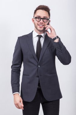 Young successful and confident man on a white background simple 