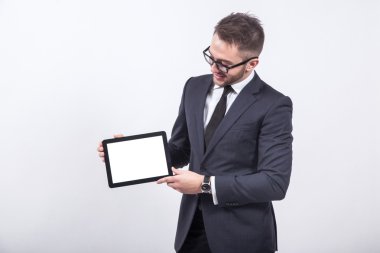 creative young engineer in a business suit with a tie and sungla
