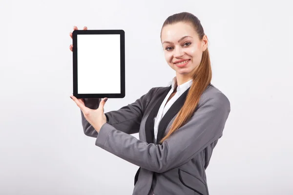 Moderna mujer de negocios joven en un traje de negocios en un fondo blanco — Foto de Stock