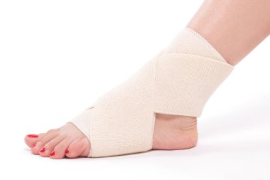 Women's ankle tied with an elastic bandage