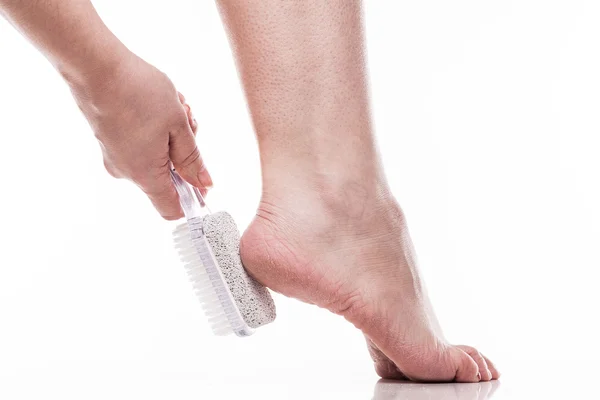 Care for dry skin on the well-groomed feet and heels with the he — Stock Fotó