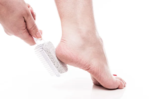 Care for dry skin on the well-groomed feet and heels with the he — Stock Fotó