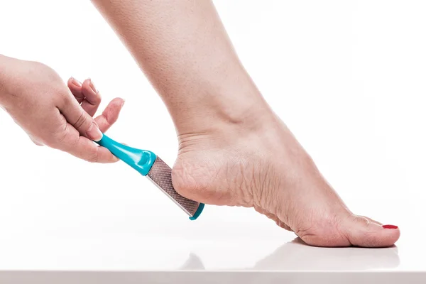 Care for dry skin on the well-groomed feet and heels with the he — 스톡 사진