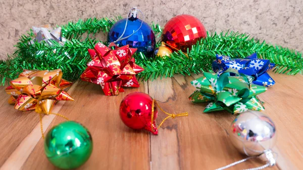 Decorations for Christmas and New Year on a wooden floor. Used f — Stock Photo, Image