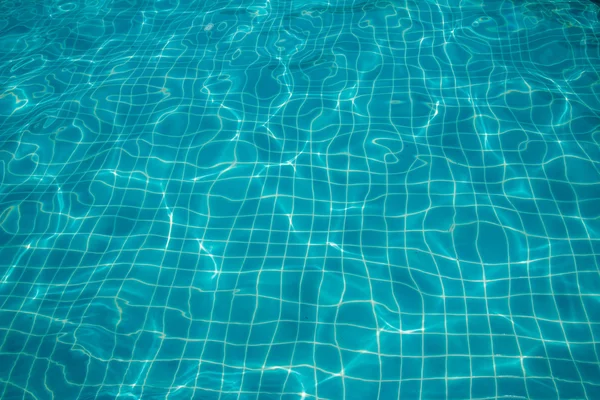 Ondulação de água na piscina, fundo de textura . — Fotografia de Stock