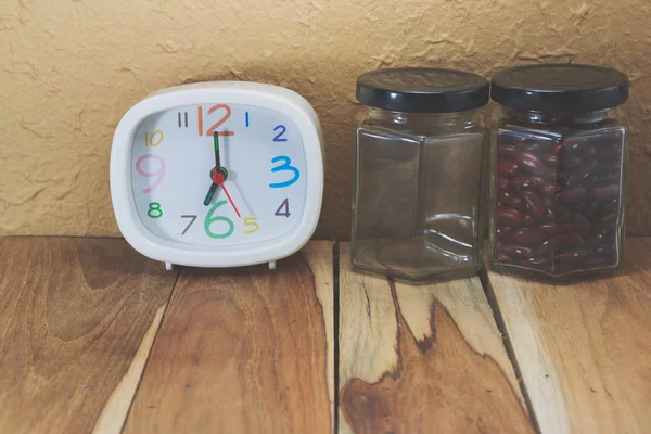 Morning time, jar and red beans on a wooden. Process color with — Stock Photo, Image