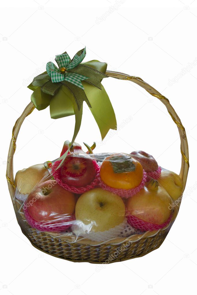 Healthy fresh fruit gift basket isolate on white background
