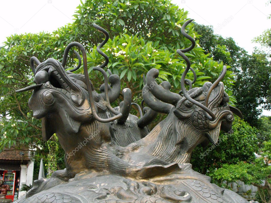 Hanoi, Vietnam, June 16, 2016: Sculpture with dragons in the Temple of Literature. Hanoi