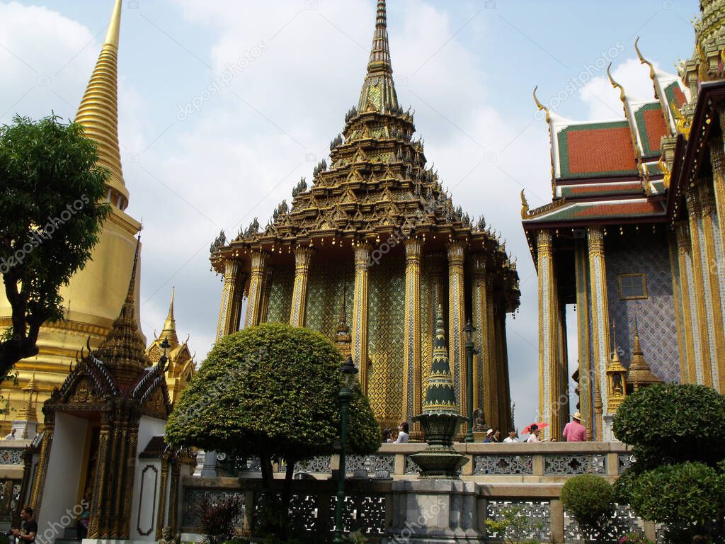 Bangkok, Thailand, January 25, 2013: Buildings richly decorated in gold at the Royal Palace in Bangkok