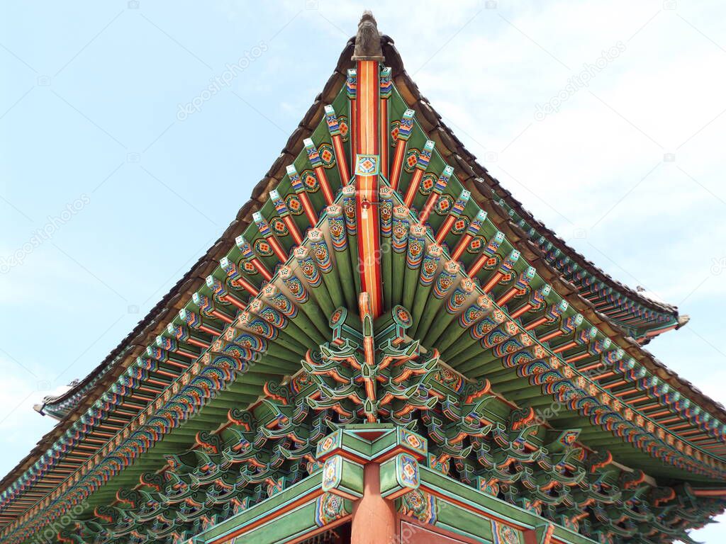 Seoul, South Korea, September 25, 2016: Decoration on the wooden ceiling of a house at Deoksugung Palace in Seoul