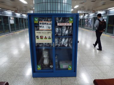 Seoul, South Korea, September 26, 2016: Cabinet with anti gas masks in Seoul subway clipart