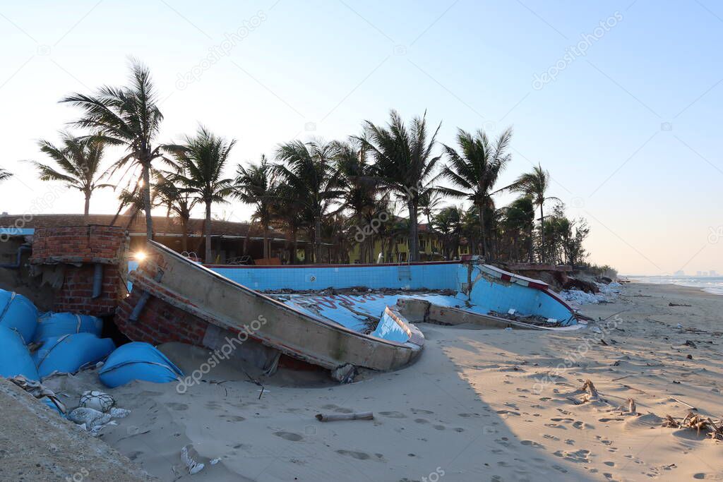 Hoi An, Vietnam, February 13, 2021: Extensive damage to a hotel pool on the central coast of Vietnam in the 2020 typhoon season