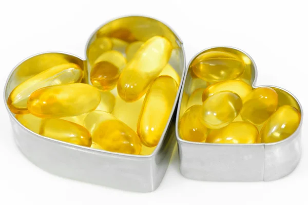 Két szív doboz hal olaj tabletták — Stock Fotó