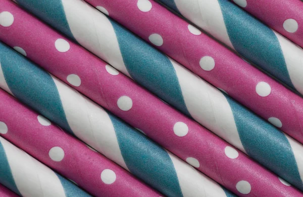 Pink dot and blue paper straw background — Stock Photo, Image