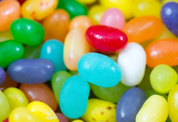 Kleurrijke Jelly bonen suikerwerk achtergrond — Stockfoto