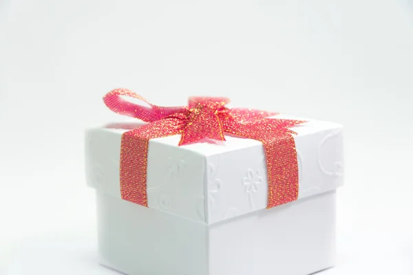 White Gift Box with Red Ribbon Isolated — Stok fotoğraf