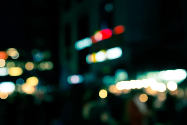 Blur defocused of neon light in urban at night abstract backgrou — Stock Photo, Image
