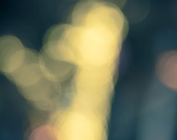 Bokeh desenfocado de la luz de la ciudad en el fondo nocturno — Foto de Stock