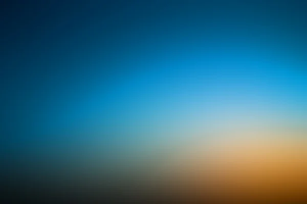 Koyu mavi ve turuncu arka plan ile soyut gradyan