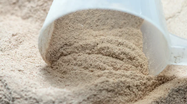 Isolate protein powder flavour with scoop macro — Stock Photo, Image