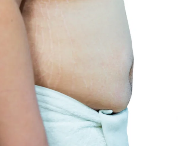 Tlustý asijské mužů žaludek na ručník boční pohled na samostatný — Stock fotografie