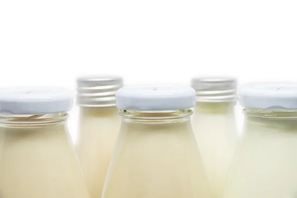Süt ve izole soya sütü şişeler — Stok fotoğraf