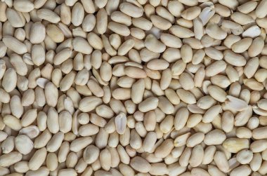 Raw peanuts for the background