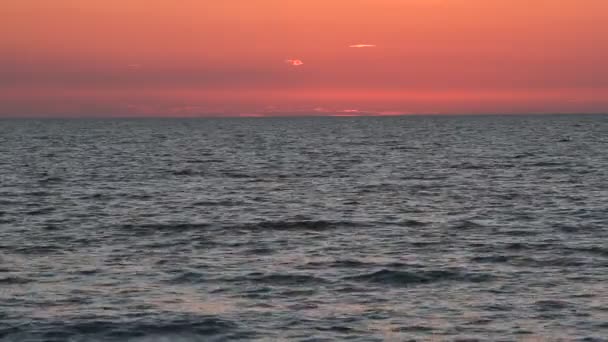 Sea surface waves sunset — Stockvideo