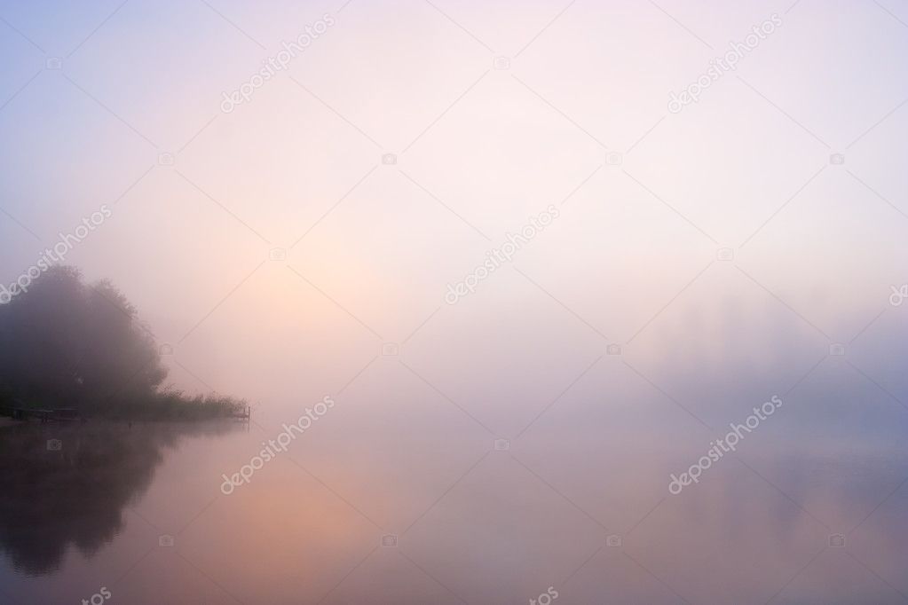 Fog sunrise lake