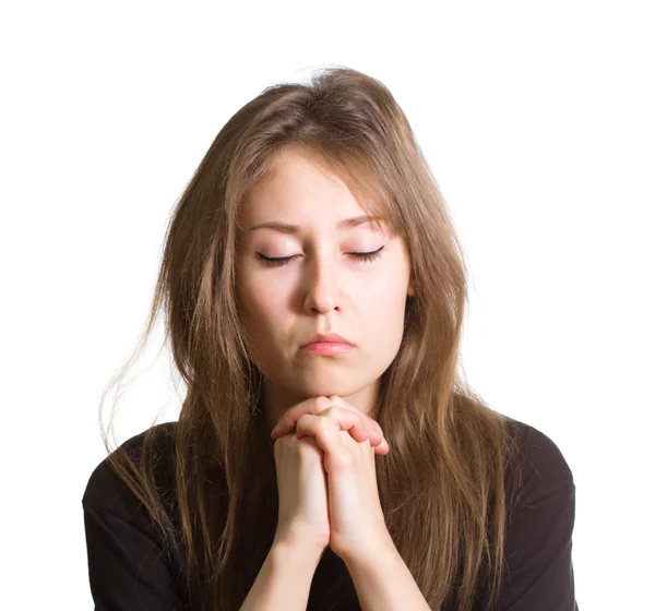 Young woman praying isolated white — Stock Photo, Image